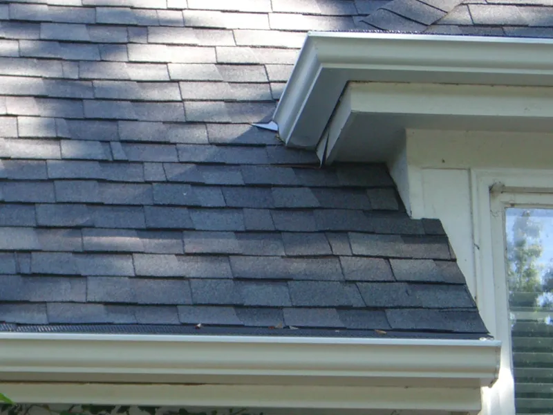 Close-up of completed Wilco Guttering gutter work at the roofline in Tulsa